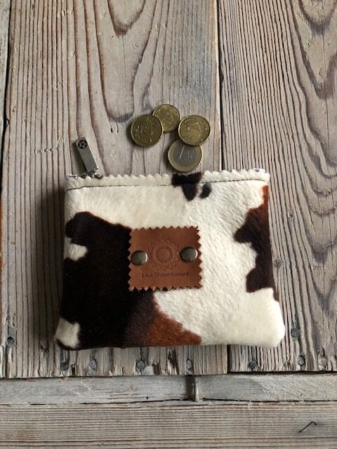 Portemonneetje met rits van bruine bontachtige koeienprint