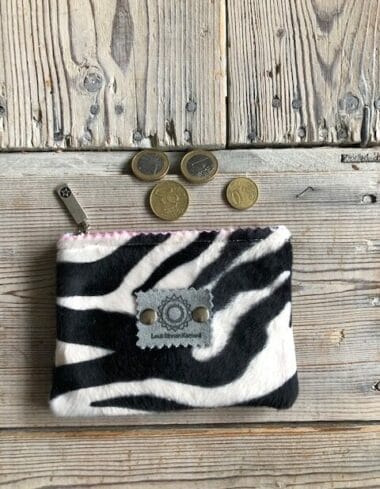 Portemonneetje met rits van bontachtige zwart witte zebraprint