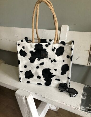 Duurzame jute shopper bekleed met bontachtige zwart witte koeienprint