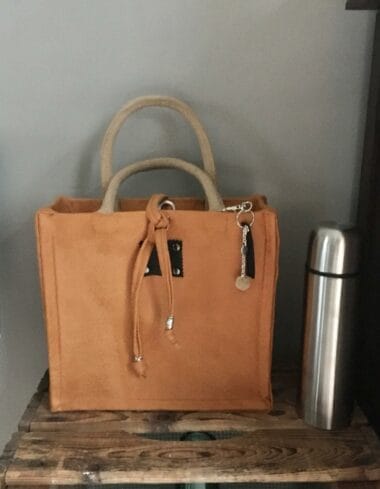 Handtas bekleed met mosterdgele leatherlook