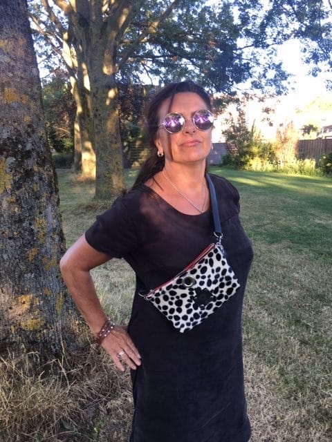 Heuptasje van bontachtige stof in beige zwarte cheetahprint