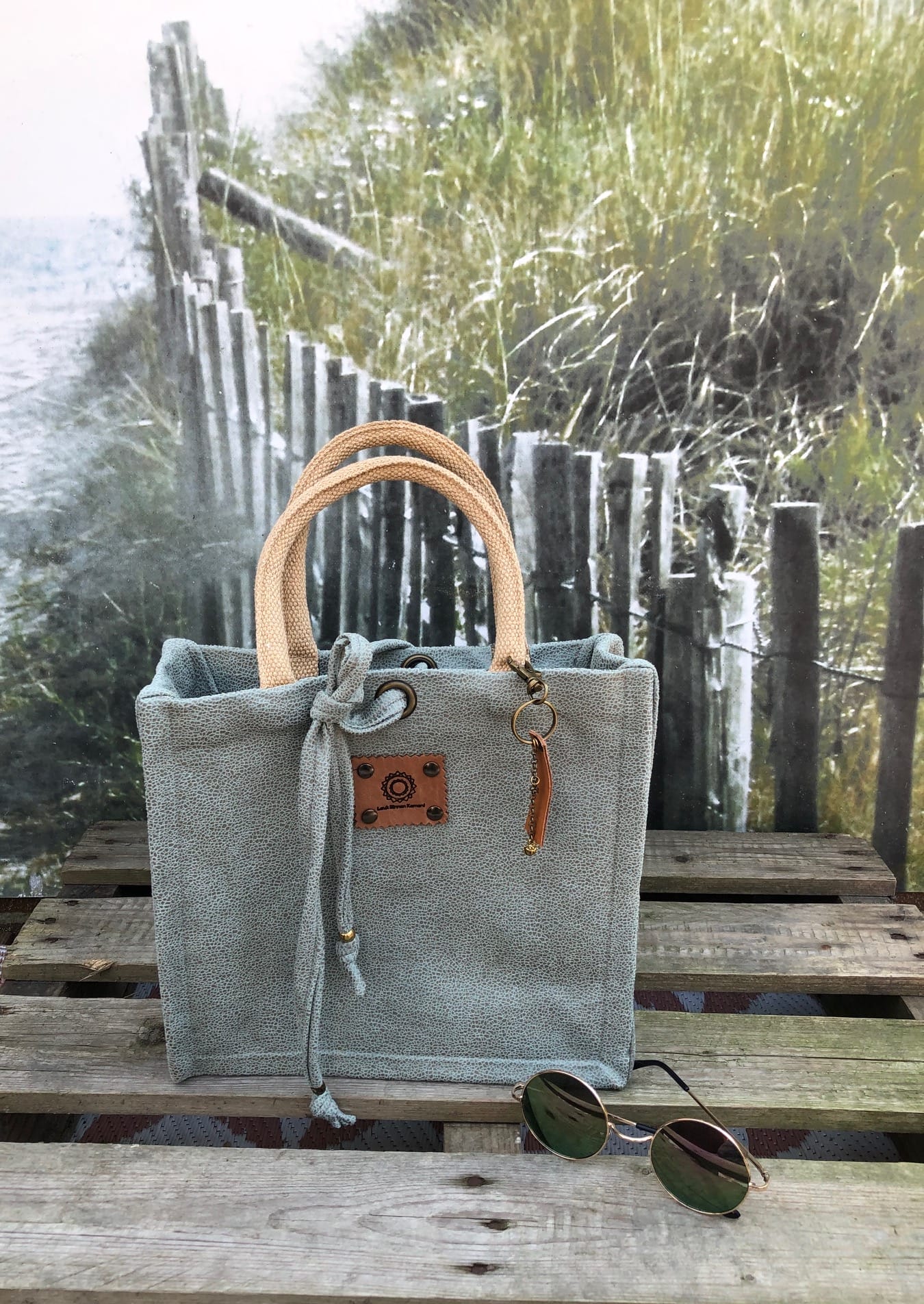 Handtas bekleed met mooie mintgroene leatherlook