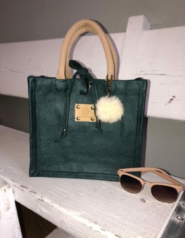 Handtas bekleed met een mooie petrolgroene leatherlook