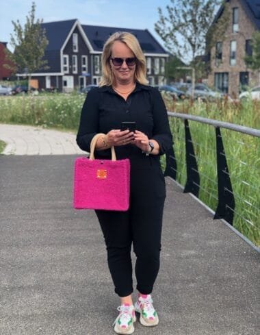 Handtas bekleed met zachte fuchsia Tedolino