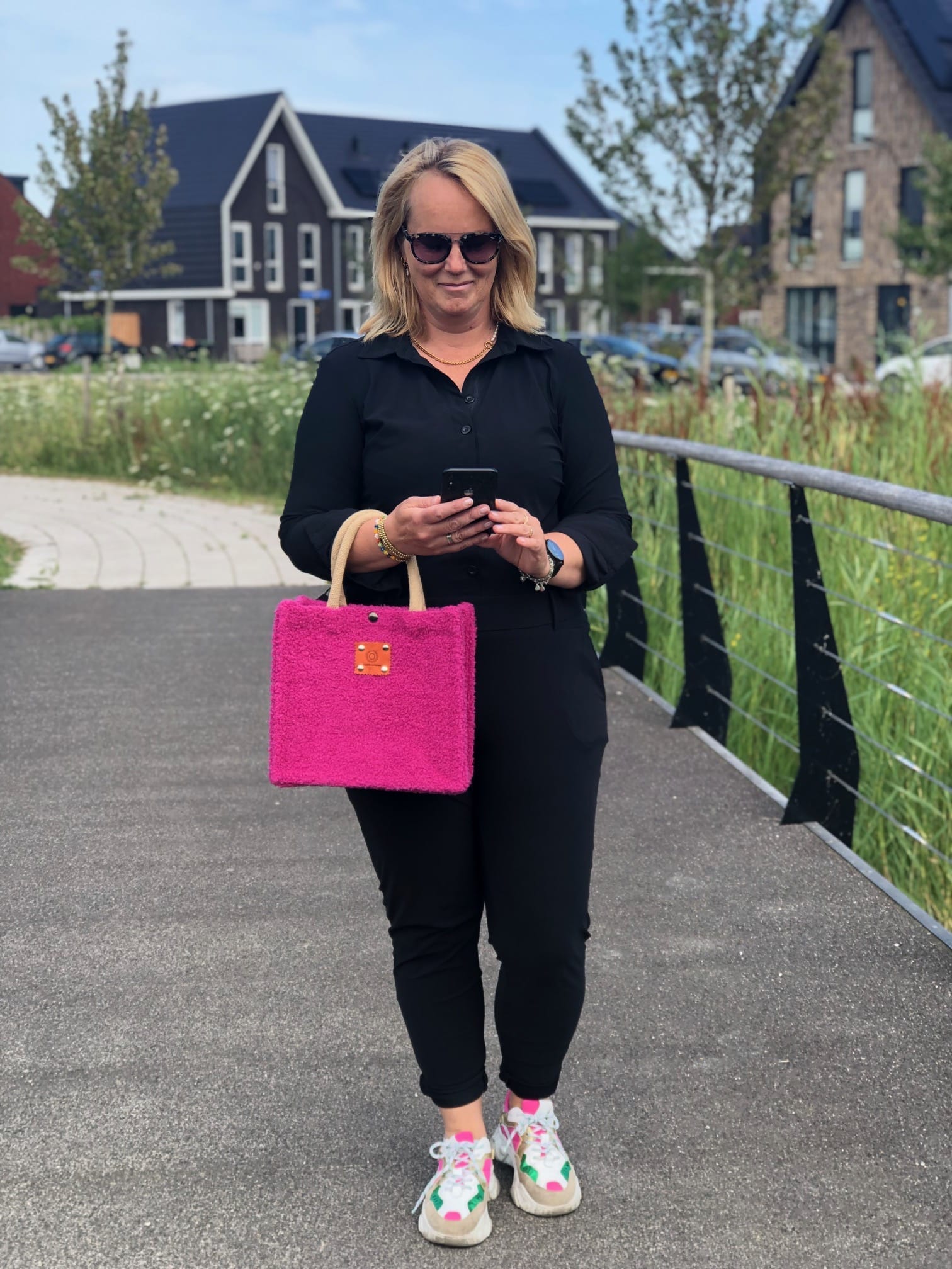 Handtas bekleed met zachte fuchsia Tedolino