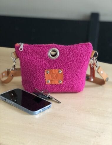 Heuptas van zachte fuchsia tedolino met verstelbare riem