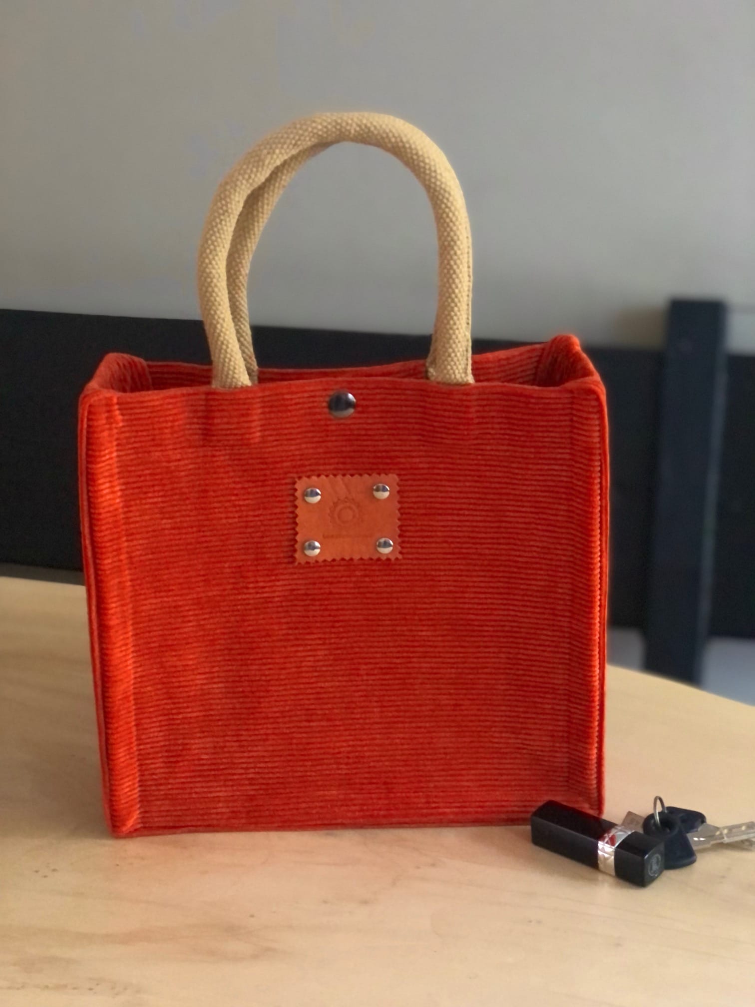 Handtas bekleed met stoere oranje ribcord