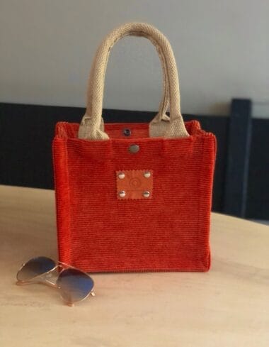 Kleine jute tas bekleed met stoere oranje ribcord