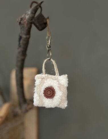 Minitasje sleutelhanger van lichtbeige panter teddy