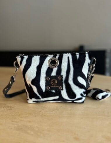 Heuptas van bontachtige zwart witte zebraprint